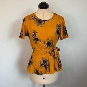 Alya (Francesca’s) Mustard & Multicolor Floral Faux Wrap Tie Front Peplum Top, S